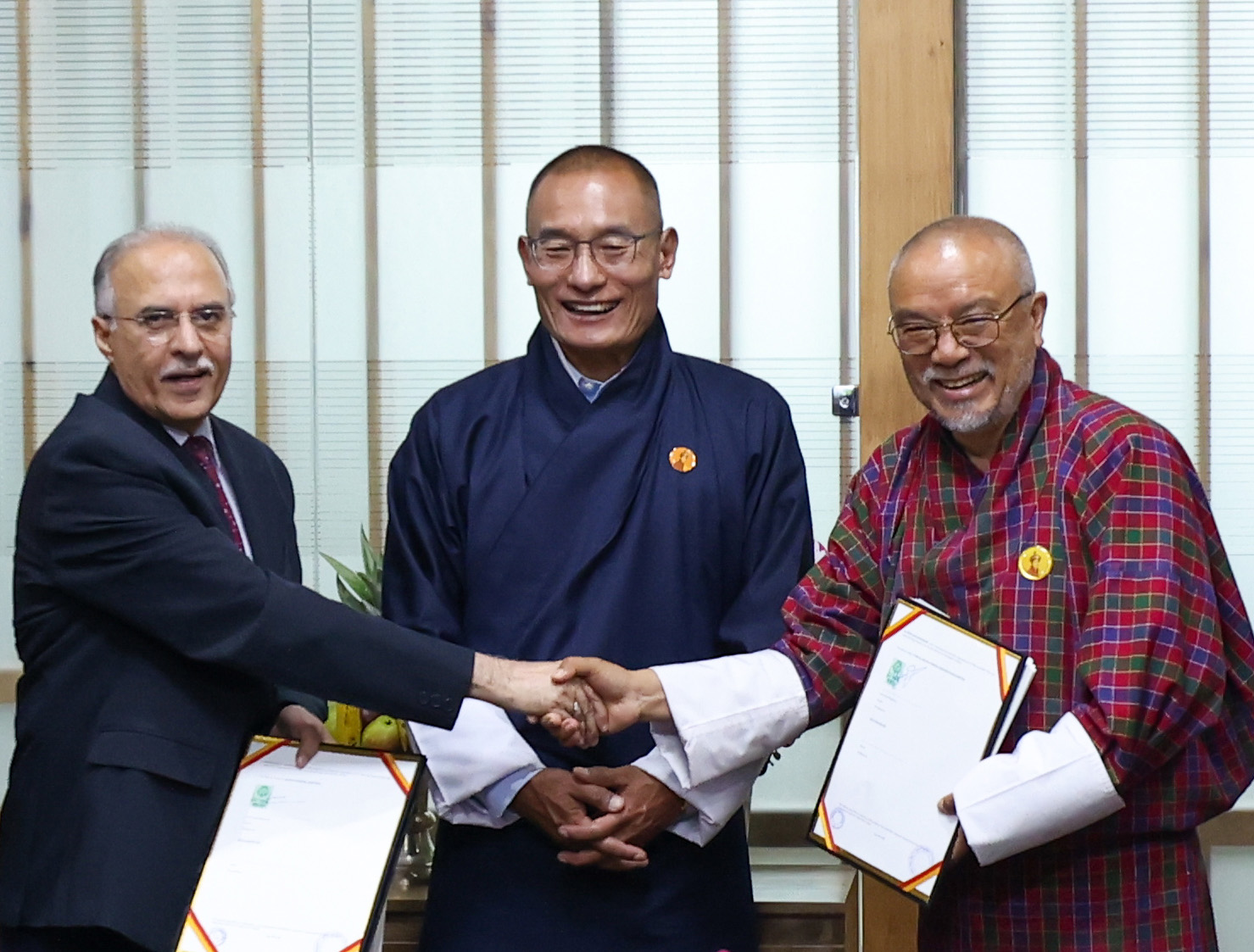 Druk Green Power and Adani Power and to set up the 770 MW Chamkharchhu-I Hydroelectric Project in Bhutan